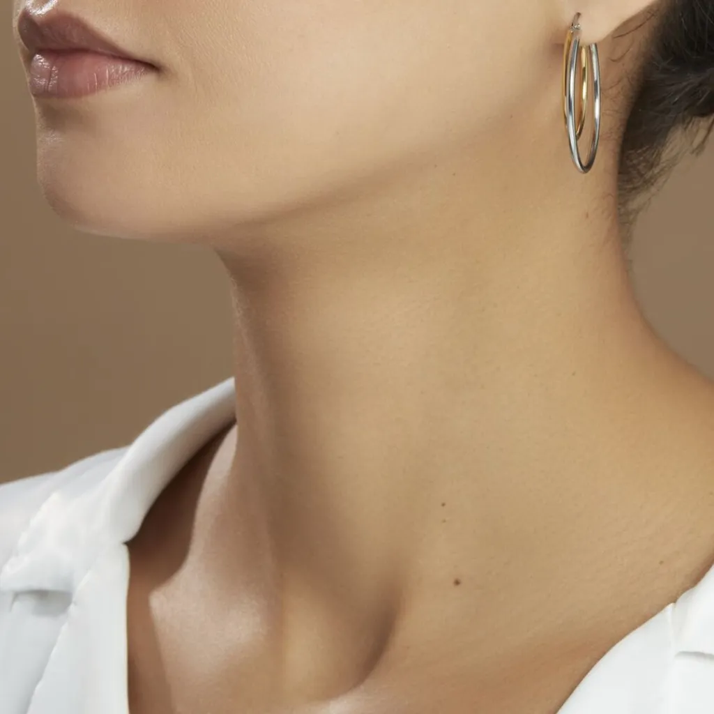 Histoire d'Or Créoles Adisson Acier Bicolore