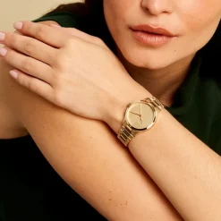 CALVIN KLEIN Montre Iconic Doré cadran doré fond doré bracelet acier doré Best