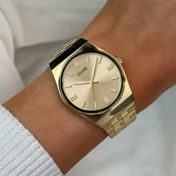 CLUSE Montre Retro 70's Doré cadran doré fond doré bracelet acier doré Best