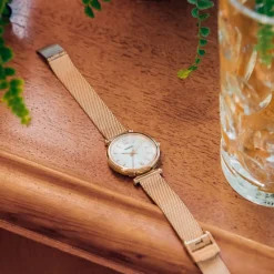 FOSSIL Montre Carlie Mini Nacre cadran doré rose fond nacre bracelet acier doré rose