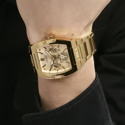 GUESS Montre Phoenix Champagne cadran doré fond champagne bracelet acier doré New