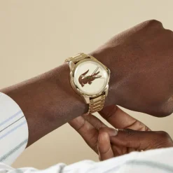 LACOSTE Montre Le Croc Champagne cadran doré fond champagne bracelet acier doré Best