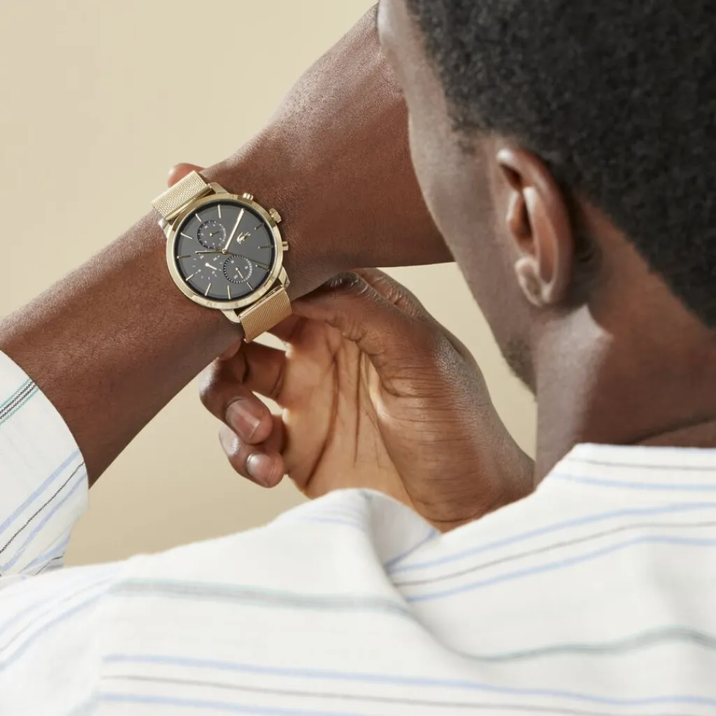 LACOSTE Montre Replay Noir cadran doré fond noir bracelet acier argenté Hot