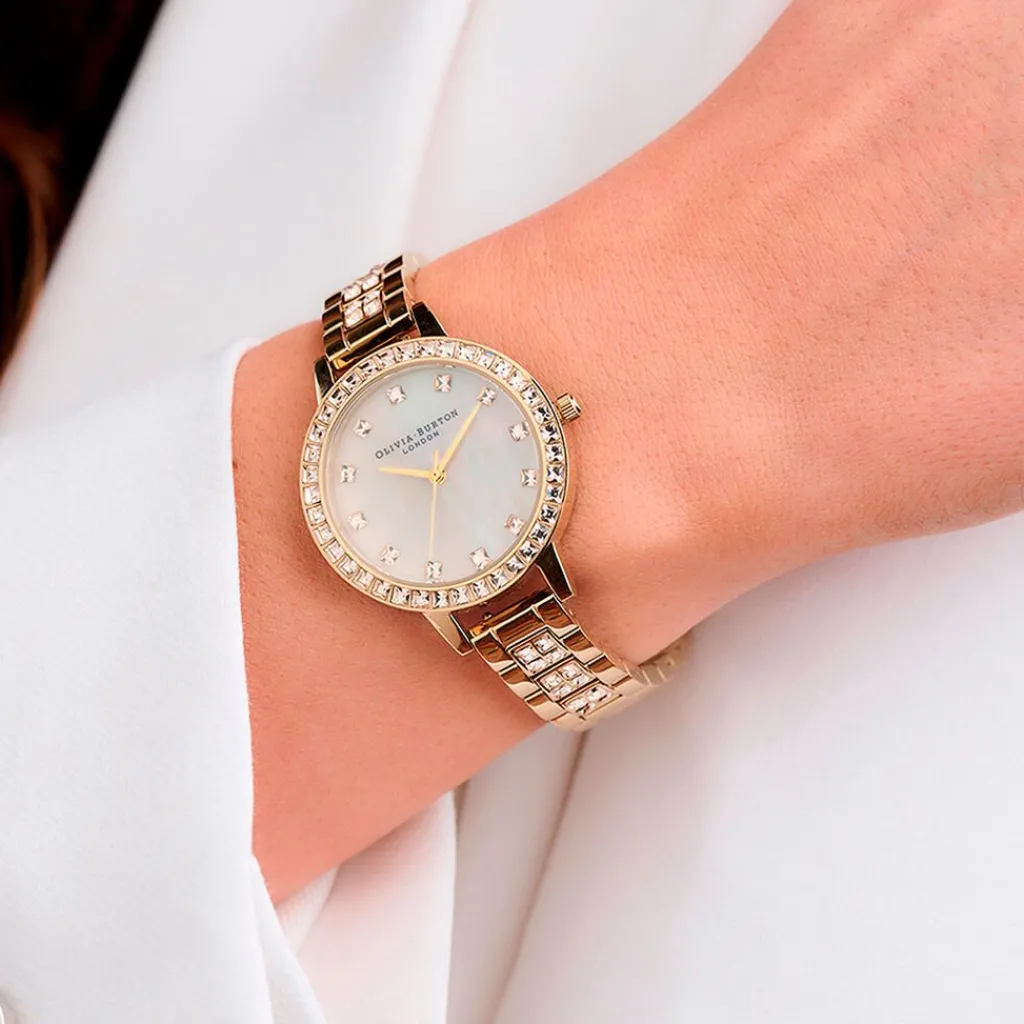 OLIVIA BURTON Montre Treasure Nacre Blanche cadran doré fond nacre bracelet acier doré Hot