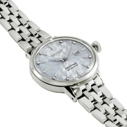 SEIKO Montre Presage Cocktail Bleu Sky cadran argenté fond bleu sky bracelet acier argenté New